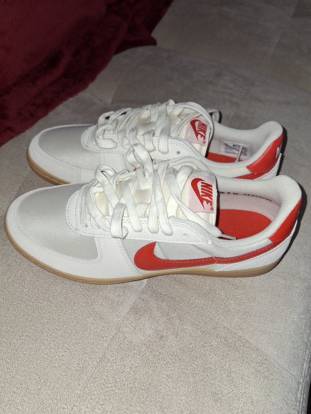 Nike White Sneakers with Red Swoosh